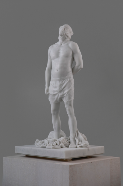 Statue of mostly nude male, blindfolded